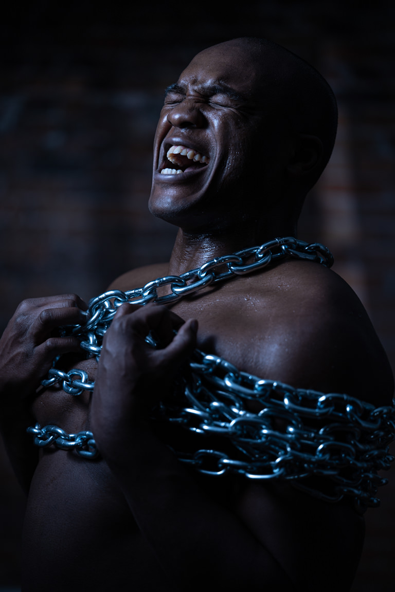 black man in chains